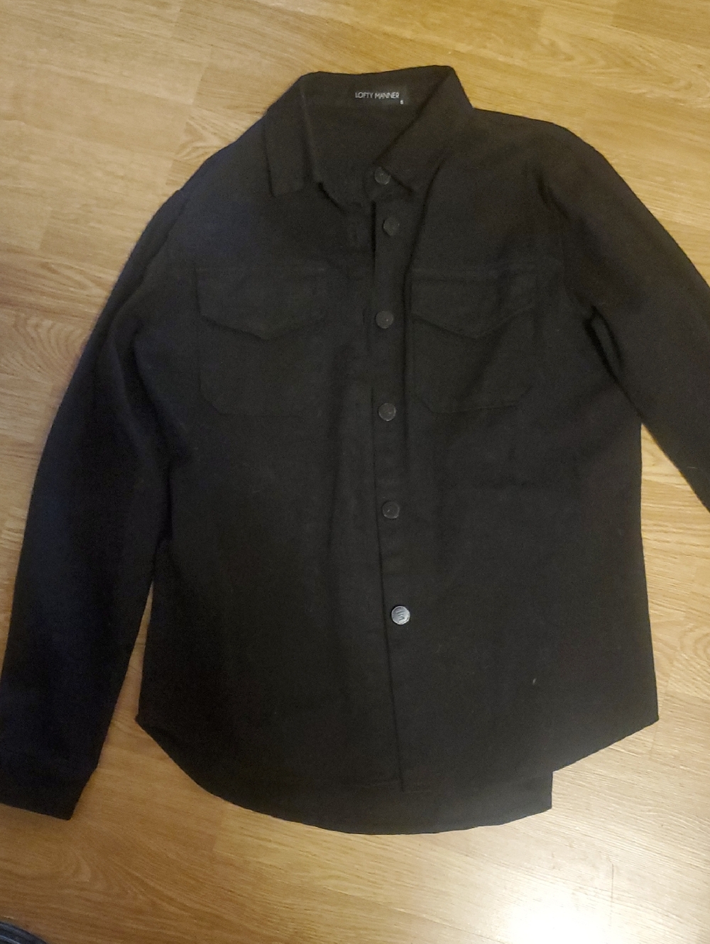 LOFTY MANNER Designed in the Neatherlands  Black Snap Button Jacket Detail